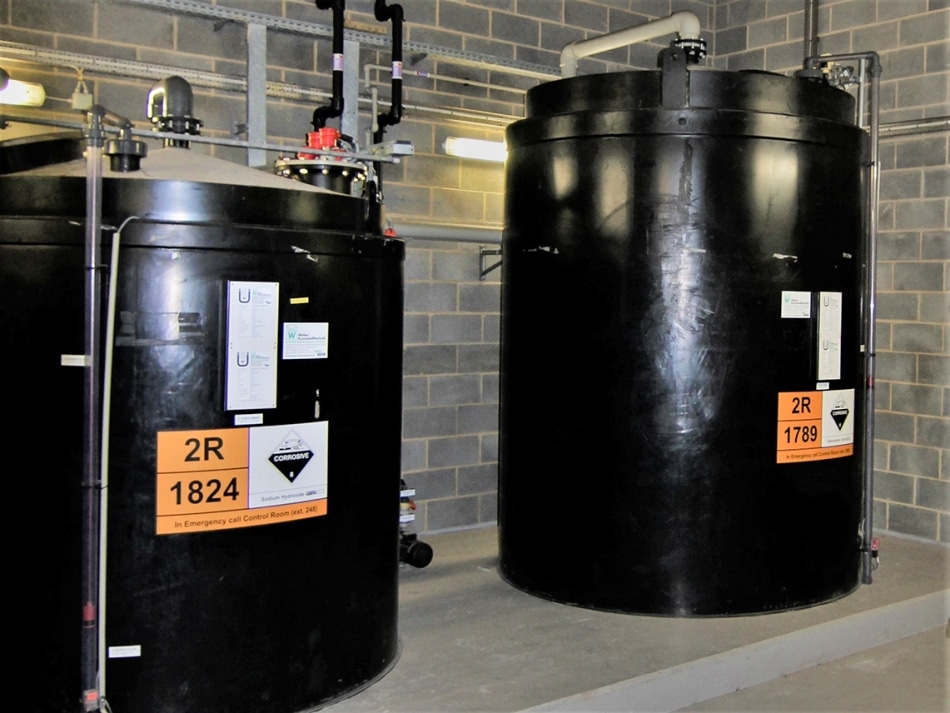 Chemical tanks for storing acids and alkalis.
