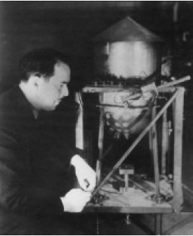 Arthur Claude Ruge, the inventor of the strain gage, working on his measurements.