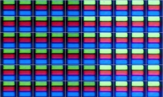 Television display pixels viewed under a microscope, each with a red, green, and blue subpixel