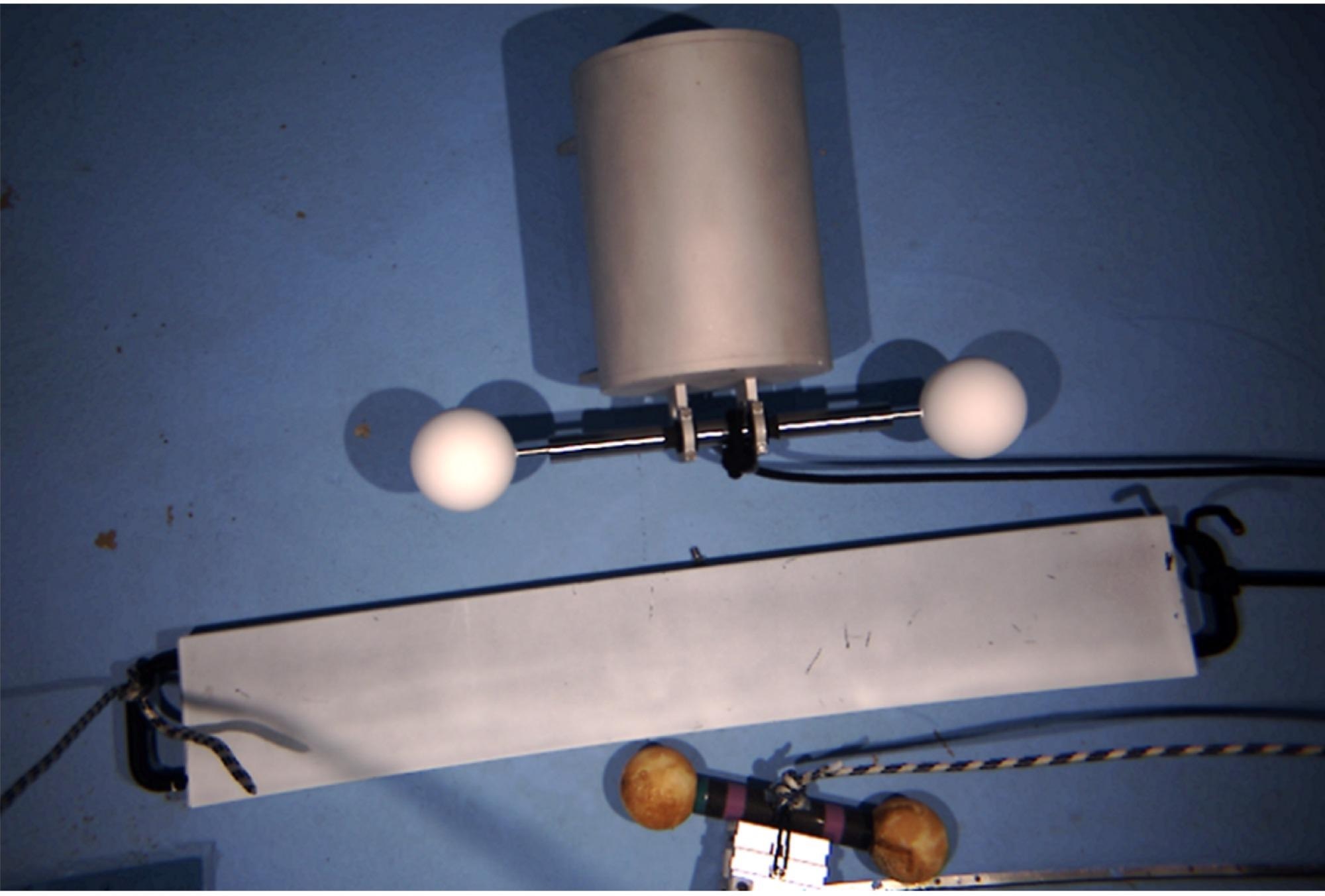 Specimen ball bars, plane-normal, and cylinder during evaluation measurements.