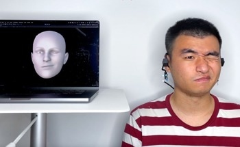 AI-Powered Acoustic Sensing Earable Constantly Tracks Facial Expressions